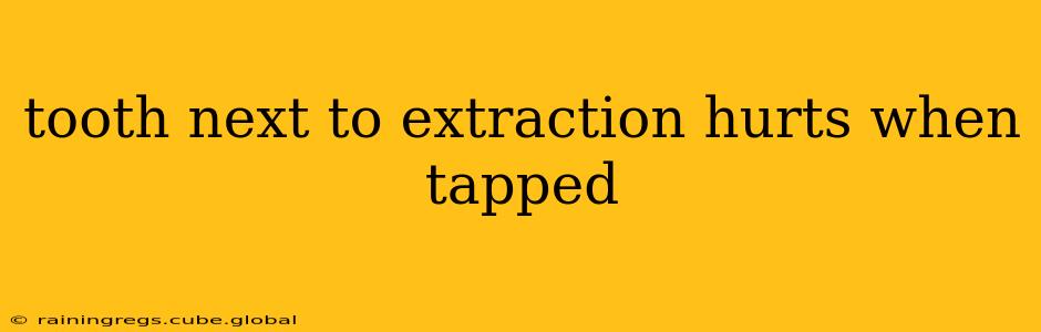 tooth next to extraction hurts when tapped